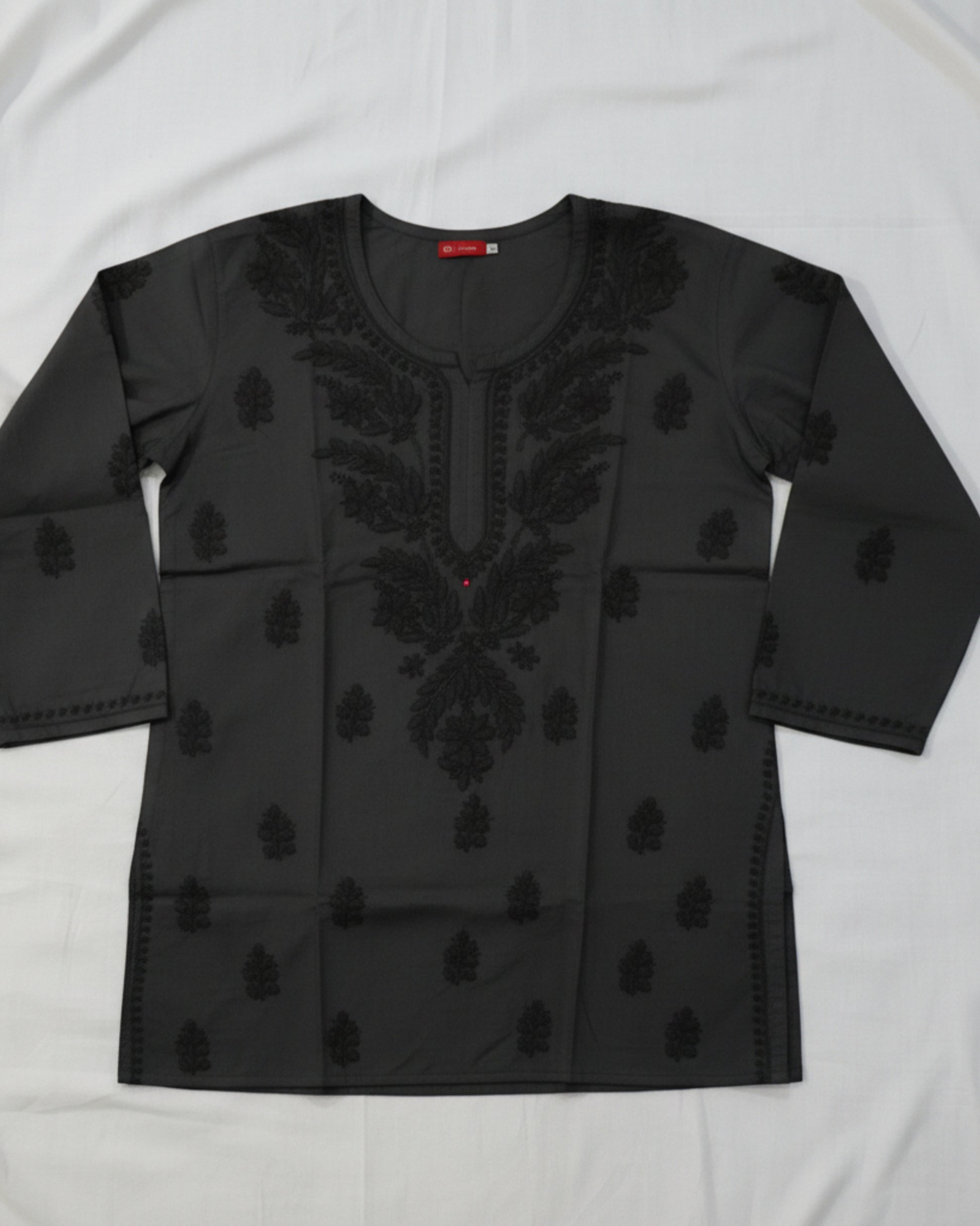Black cotton short top with heavy chikankari work - flat lay front view