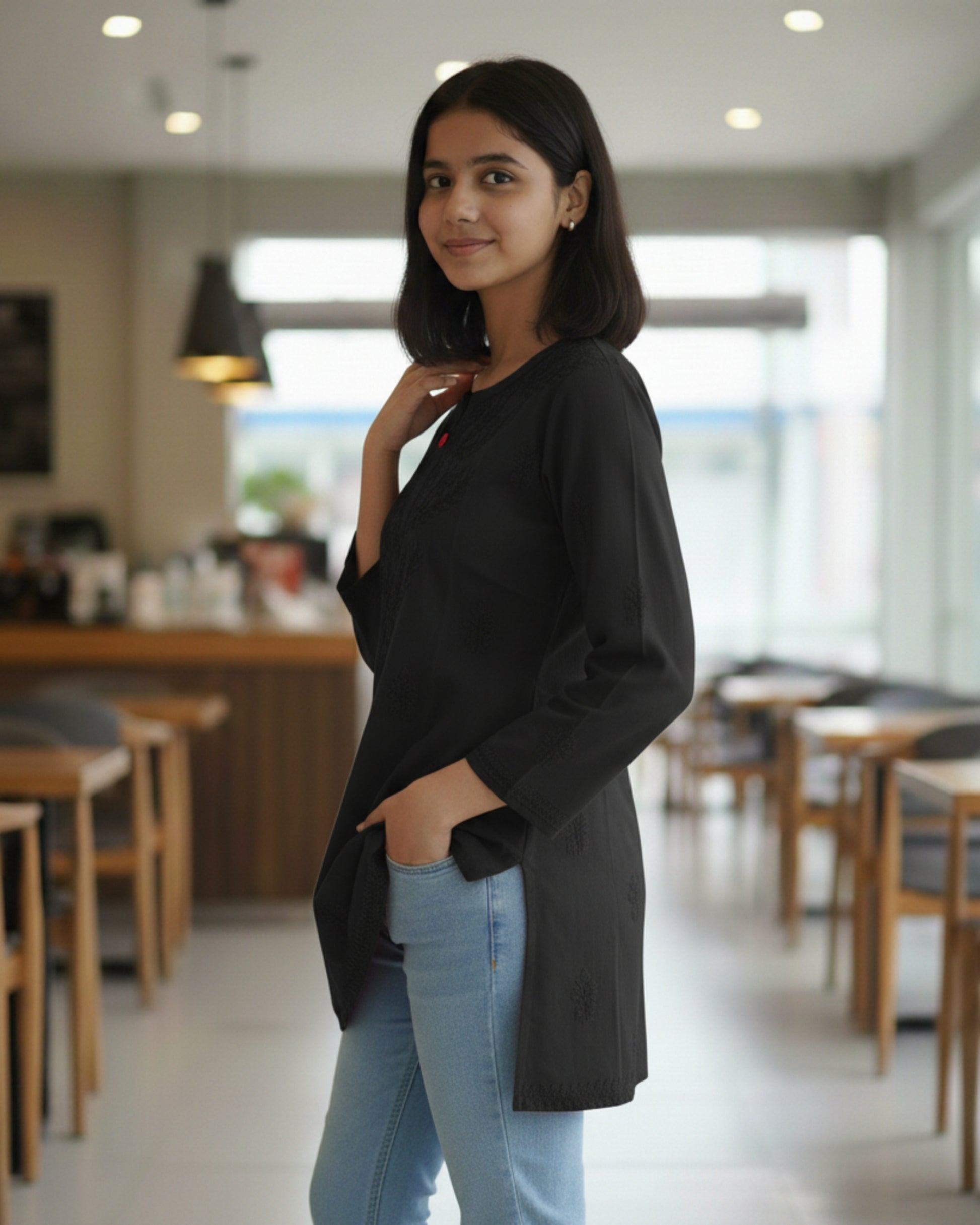 Black cotton short top with heavy chikankari work - side view