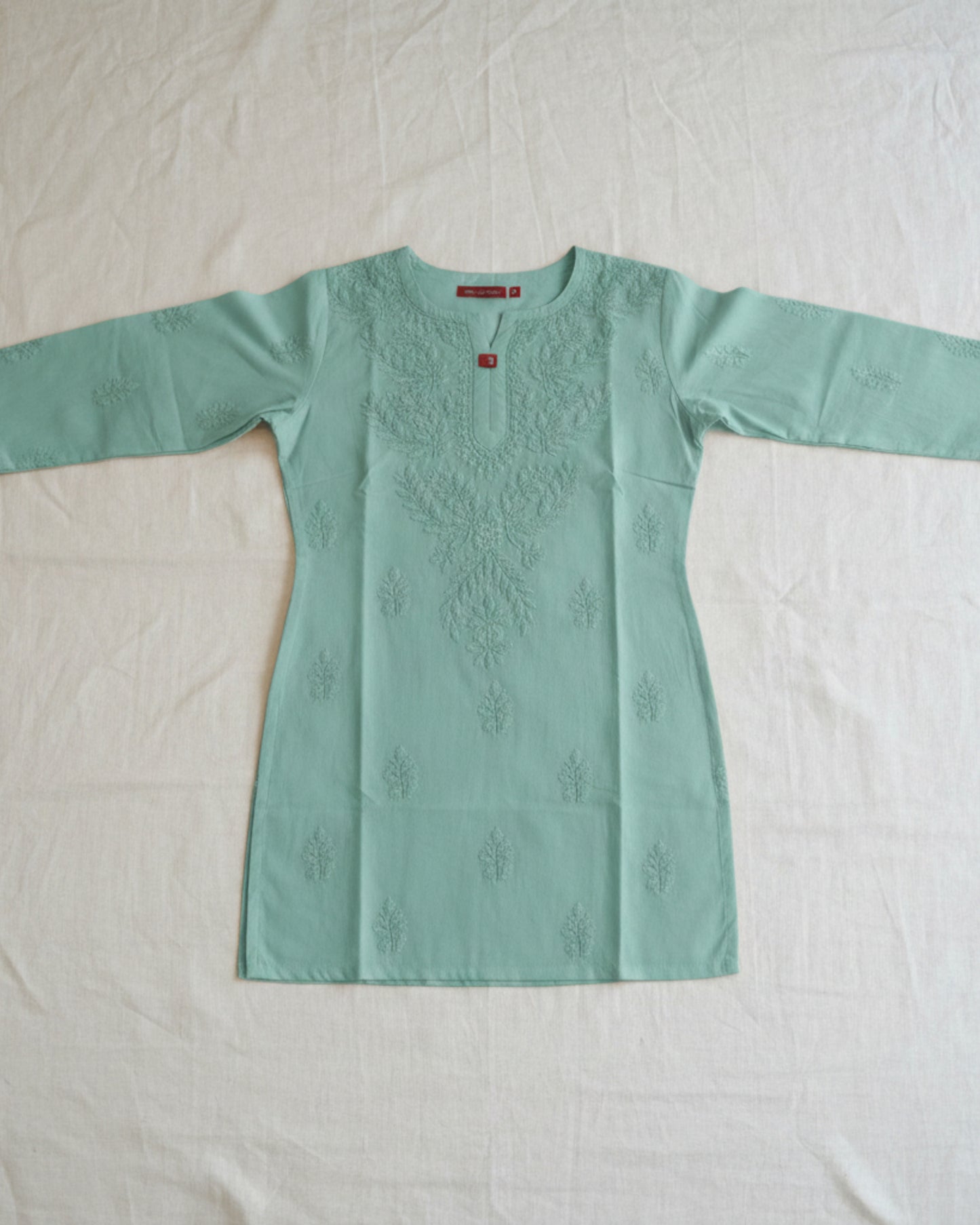 Olive cotton short top with heavy chikankari work - flat lay front view