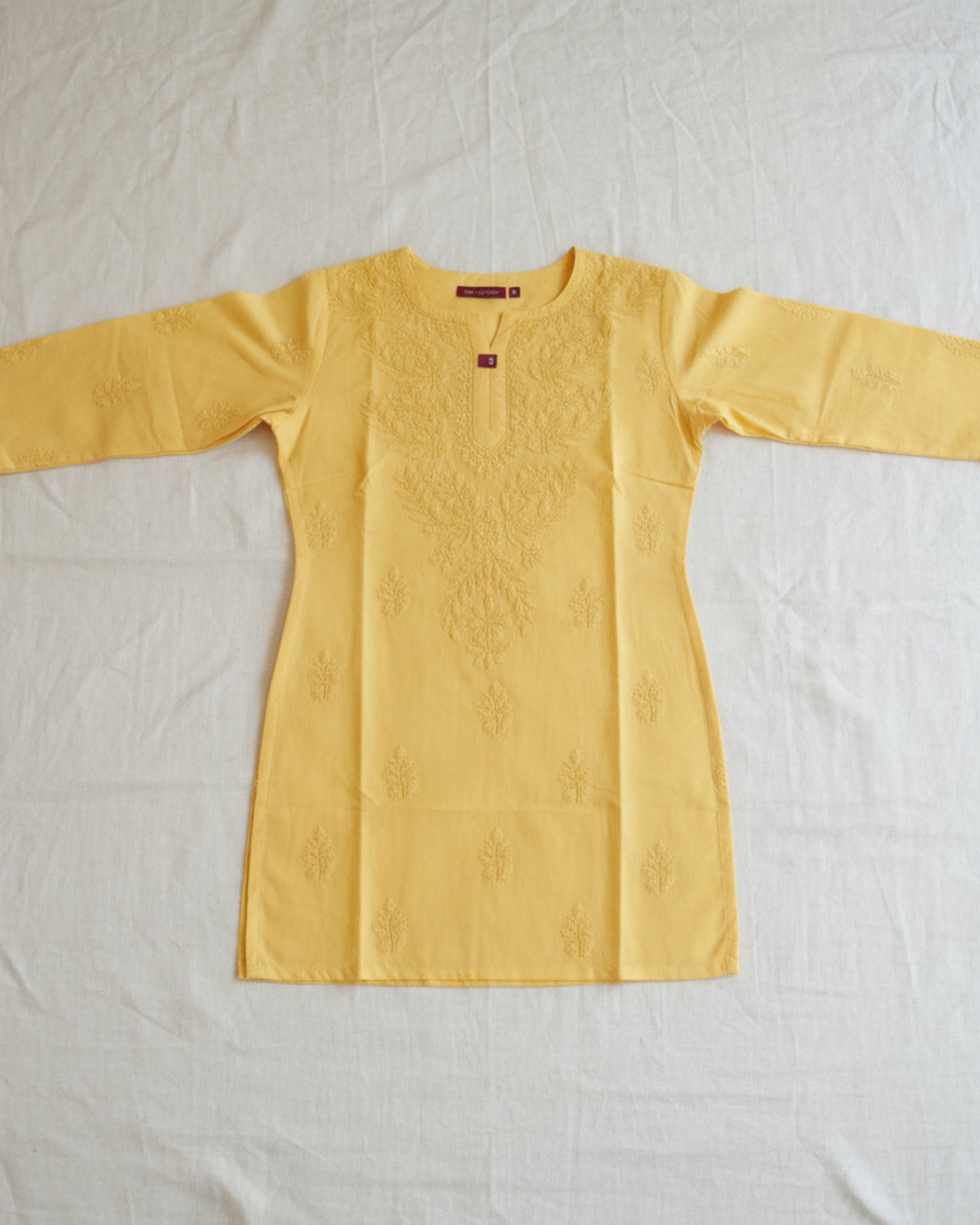 Yellow cotton short top with heavy chikankari work - Flat lay front view